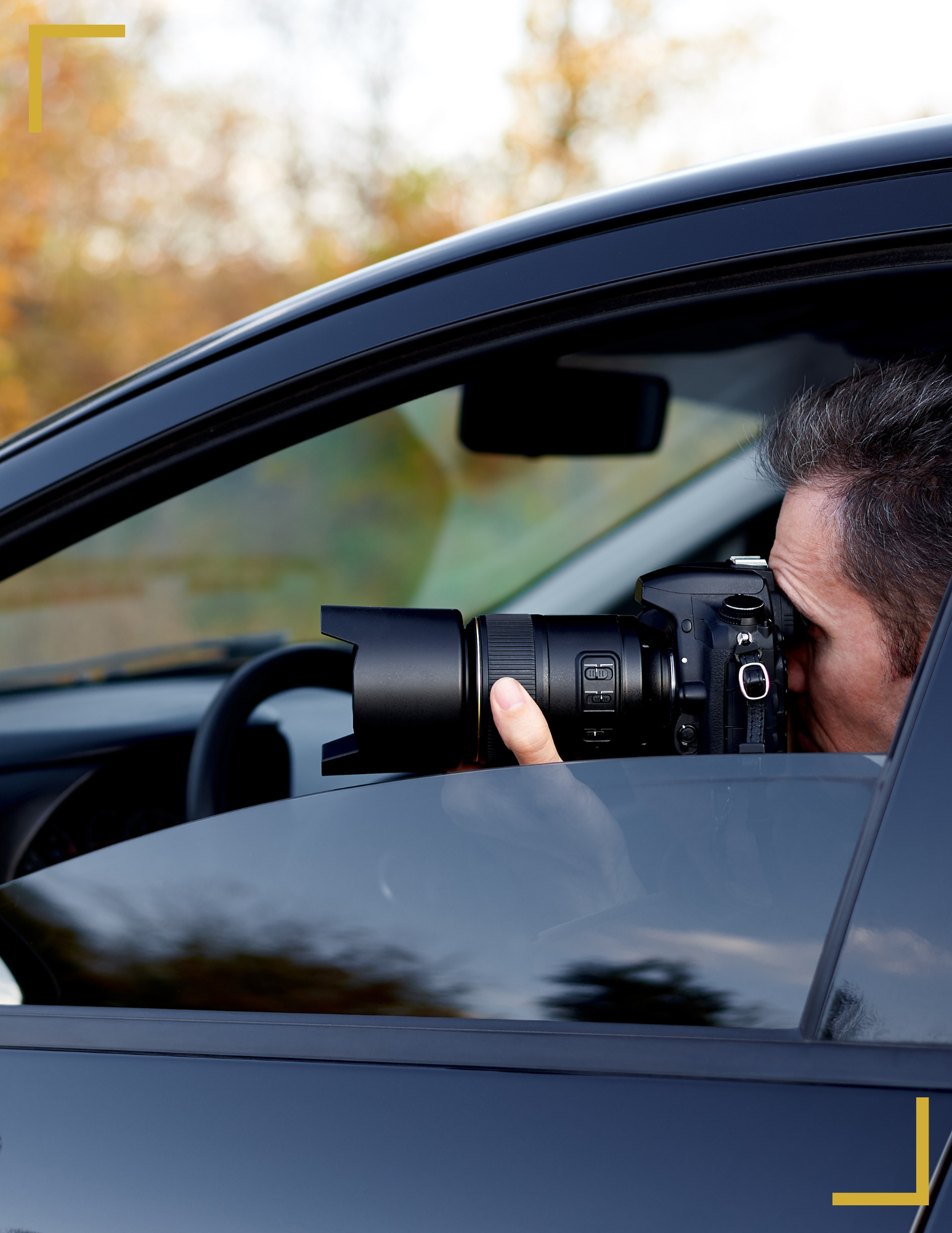 Investigator using a camera from inside a vehicle